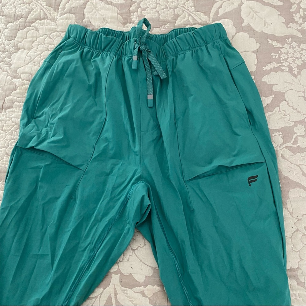 Fabletics men- The One Joggers with zip pockets and water resistant material